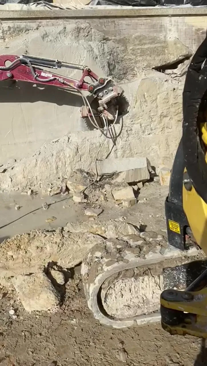 Saw-cut rock wall for the garage